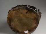 an image of a close up of a piece of wood with a tag on it