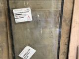 a picture of a glass door with a sticker on it