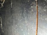 a stick sticking out of the side of a wall