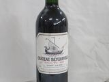 a bottle of wine that is sitting on a table