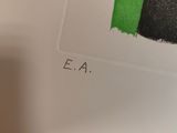 a close up of a refrigerator with a green and black stripe on it