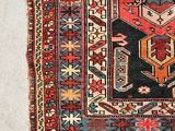 an image of a rug with a pattern on it on a white surface