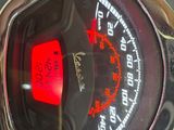 a close up of a speedometer on a motorcycle