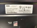 a close up of the back of a microwave oven