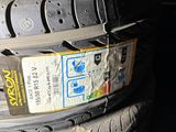 several tires stacked on top of each other in a garage