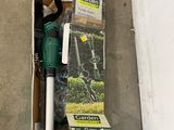 a picture of a box of gardening equipment on the ground