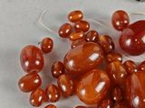 a bunch of beads that are sitting on a table