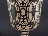 pair of silver and glass goblets with black and white designs