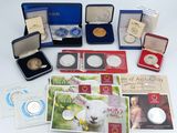 a lot of coins and other items that are on the table