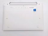 a white laptop with a blue sticker on the side of it