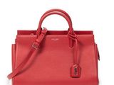 a red handbag on a white background