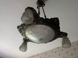 a light that is hanging from the ceiling in the room