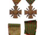 six medals of the order of the iron cross, including a cross, and a cross of the order of the iron cross, on a white background