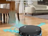 une photo d'un aspirateur robot posé sur le sol d'un salon