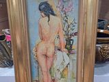l'image d'un tableau représentant une femme nue dans un cadre doré