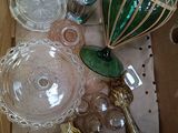 a box full of glass items that are sitting on a table
