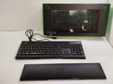a keyboard and mouse sitting on a desk next to a monitor