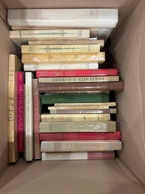 a box full of books that are sitting on a table