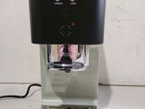 a coffee maker that is sitting on a counter