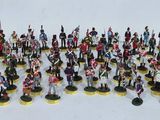 un grand nombre de figurines posées sur une table