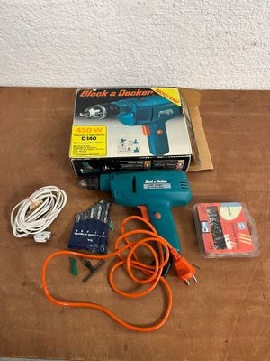 BLACK & DECKER, perceuse 450 W D140 et ses forets, une boîte…