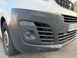 a close up of the front bumper of a van