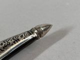 a pen that is sitting on a table
