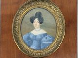 tableau représentant une femme en robe bleue, dans un cadre en bois