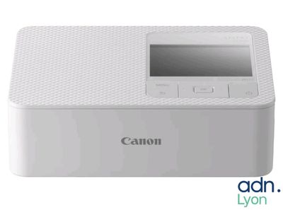 un gros plan d'une imprimante Canon sur fond blanc