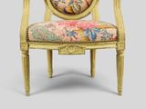 an image of a chair with a floral upholstered seat