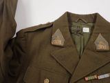an image of a military uniform with a medal on the lapel