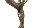 statue of an eagle on a pedestal with a white background