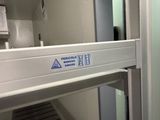 an image of a bathroom that has a sign on the door