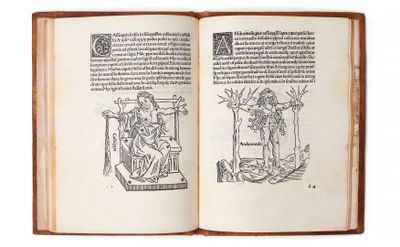 un livre ouvert sur lequel figure le dessin d'un homme assis sur une chaise