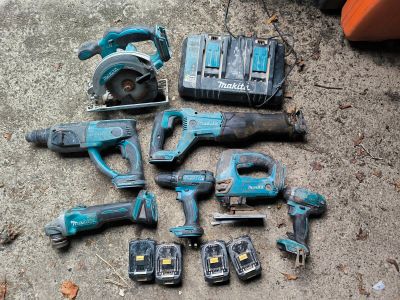 a lot of tools that are laying out on the ground