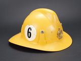 an image of a yellow hard hat with a number 6 on it