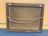 a picture of a wooden frame with a rope on it