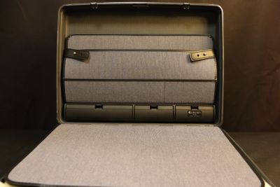 a suitcase that is open on a table