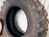 a tire that is sitting next to a fire hydrant