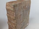 two pieces of wood sitting next to each other on a table