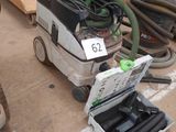 a lot of tools that are sitting on the floor