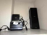 a lot of electronics that are sitting on a shelf