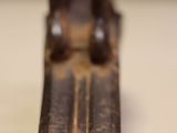 close up of a piece of wood that is sitting on a table