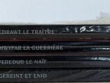 a stack of books sitting on top of a table