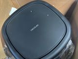 a box with a black object inside of it