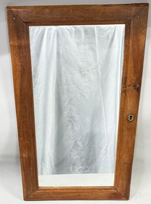 an image of a wooden frame with a mirror in it