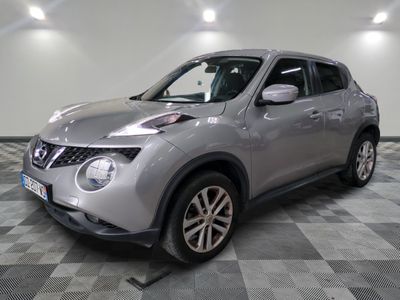 the nissan juke suv is parked in a clean room