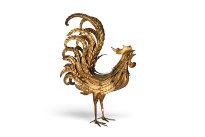 figurine représentant un coq doré sur fond blanc, avec un fond blanc