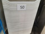 a picture of a refrigerator with a 50 sign on it