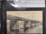 a picture of a postcard with a picture of a man in a boat on the water